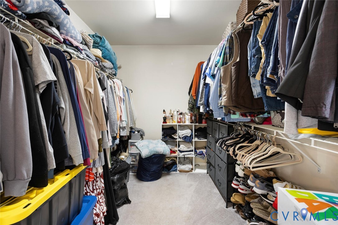 15650 River Road Chesterfield, VA 23838 - Photo 21 of 50 a view of walk in closet with clothes and shoes