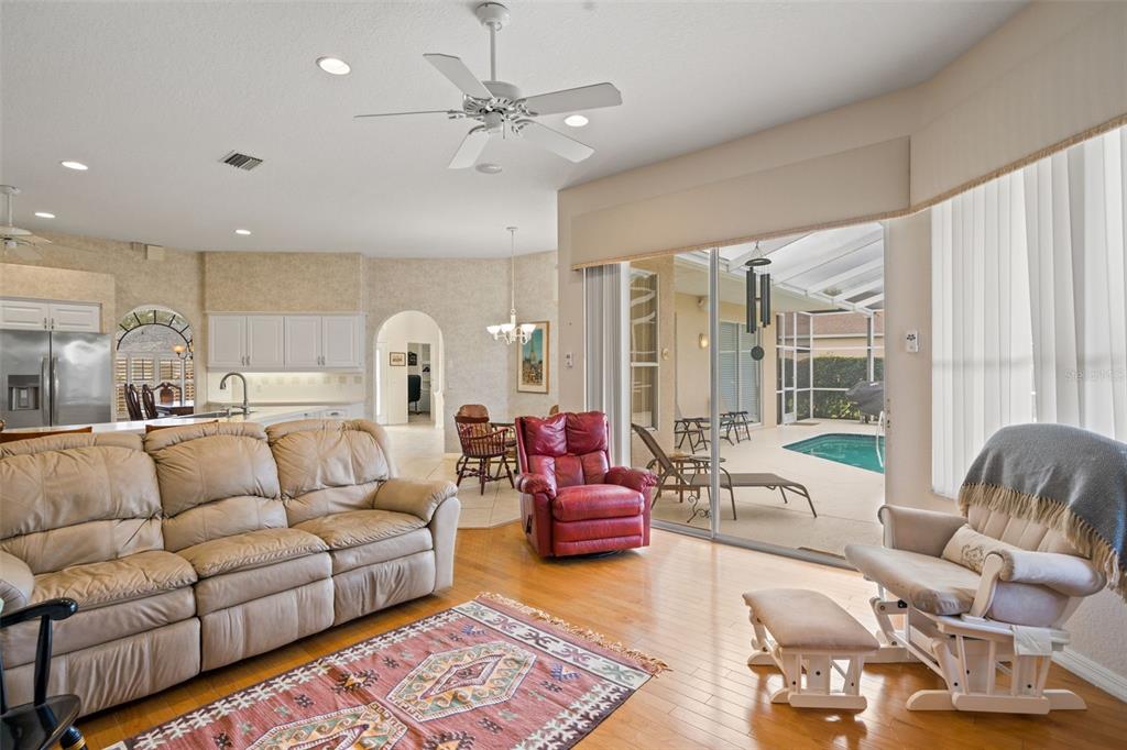 8405 Maybelle Drive Weeki Wachee, FL 34613 - Photo 17 of 61 a living room with furniture or couch and a large window