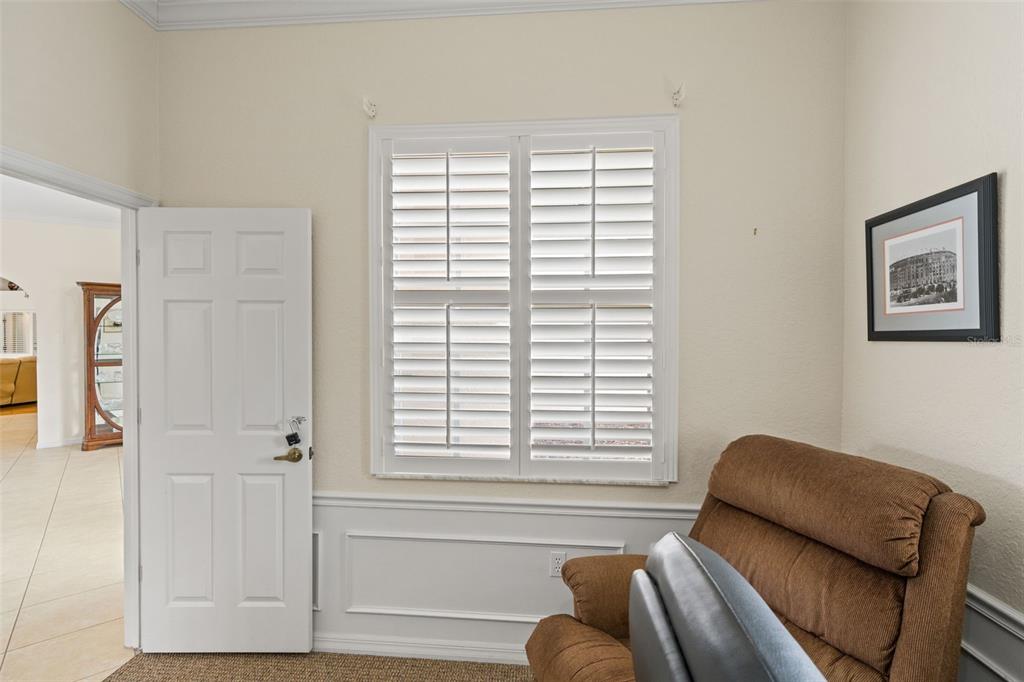 8405 Maybelle Drive Weeki Wachee, FL 34613 - Photo 22 of 61 a bedroom with furniture and a window