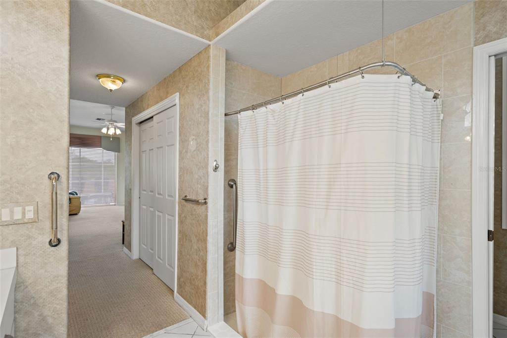 8405 Maybelle Drive Weeki Wachee, FL 34613 - Photo 33 of 61 a bathroom with a shower and a sink