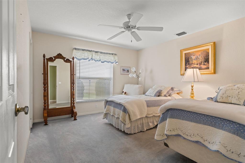 8405 Maybelle Drive Weeki Wachee, FL 34613 - Photo 34 of 61 a bedroom with bed and a window