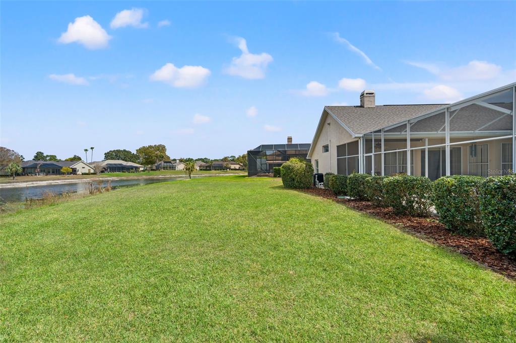 8405 Maybelle Drive Weeki Wachee, FL 34613 - Photo 42 of 61 a view of a house with a yard and a garage