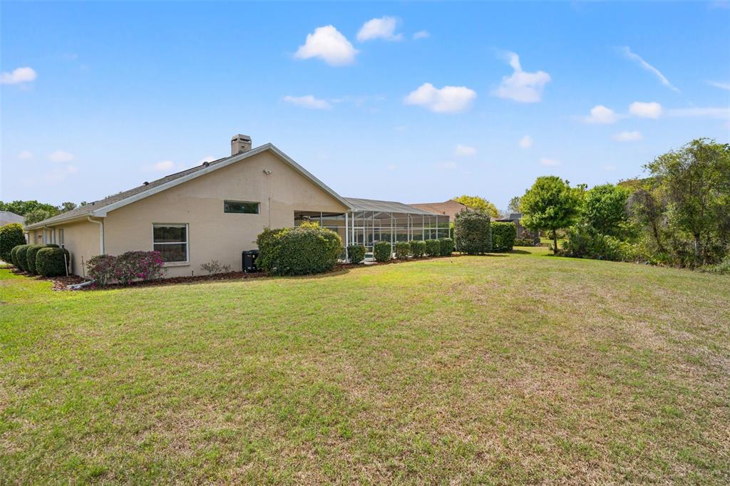 8405 Maybelle Drive Weeki Wachee, FL 34613 - Photo 46 of 61 a view of a house with a backyard