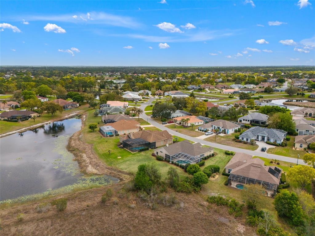 8405 Maybelle Drive Weeki Wachee, FL 34613 - Photo 48 of 61 an aerial view of residential building with outdoor space