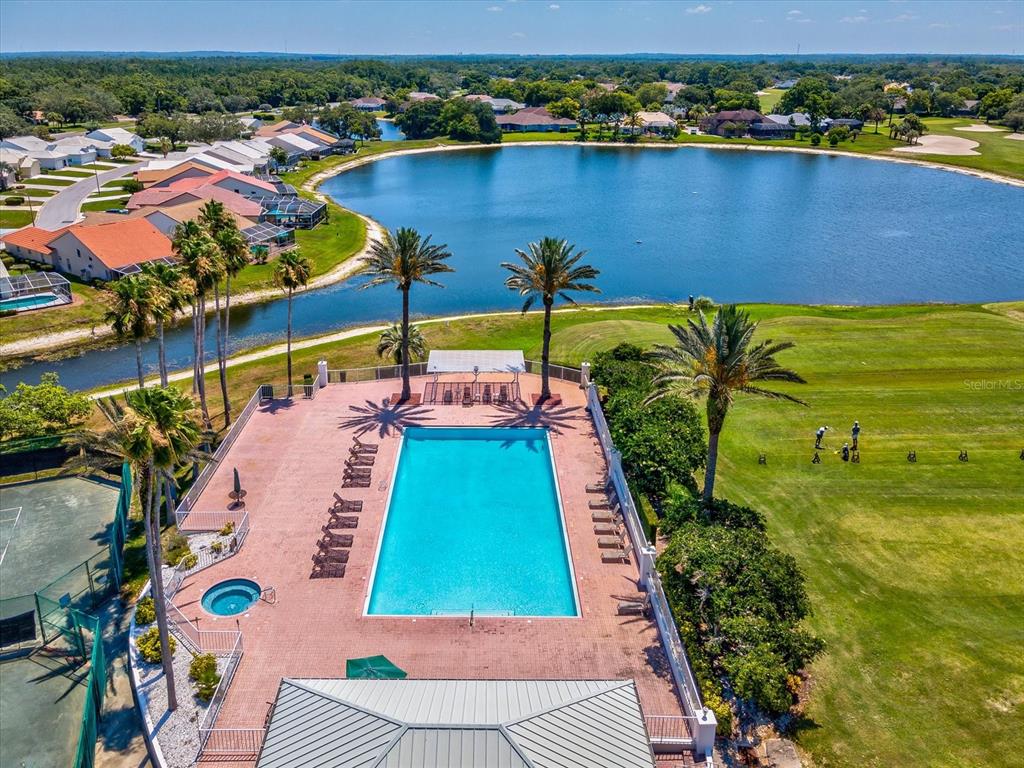 8405 Maybelle Drive Weeki Wachee, FL 34613 - Photo 54 of 61 an aerial view of tennis court