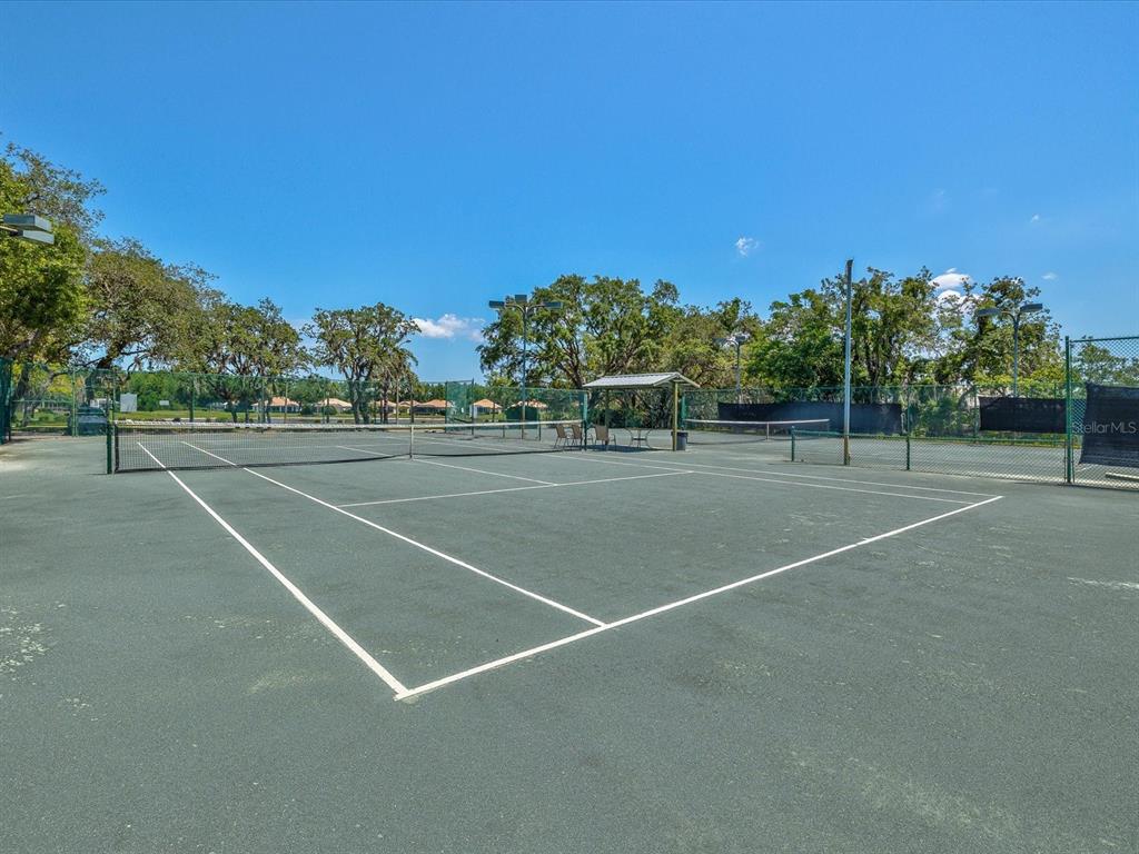 8405 Maybelle Drive Weeki Wachee, FL 34613 - Photo 60 of 61 a view of a tennis court