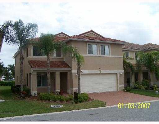 1048 Big Torch Street Riviera Beach, FL 33407 - Photo 1 of 11 Primary Photo