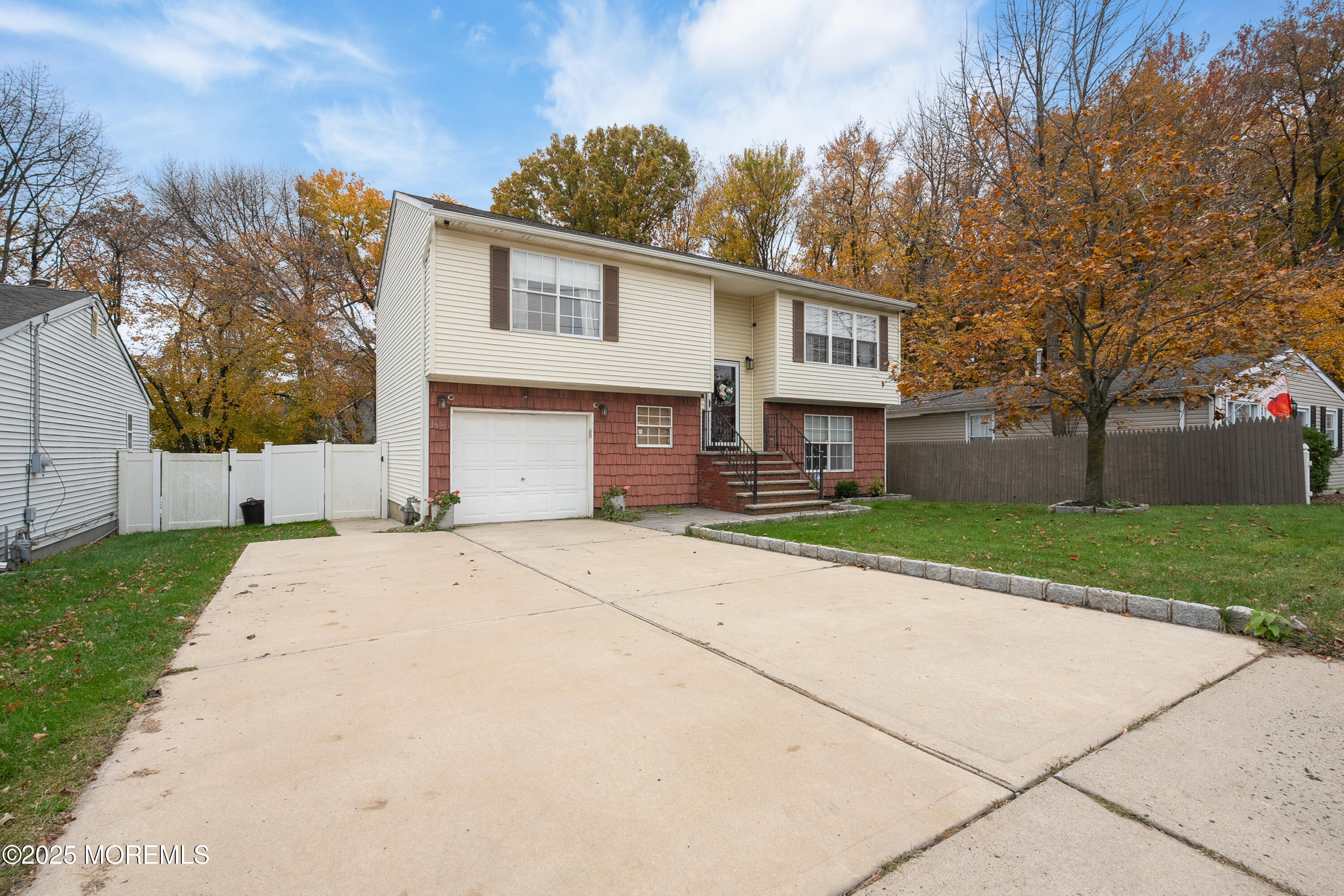121 Milton Avenue Cliffwood, NJ 07721 - Photo 1 of 34 front view of a house with a yard