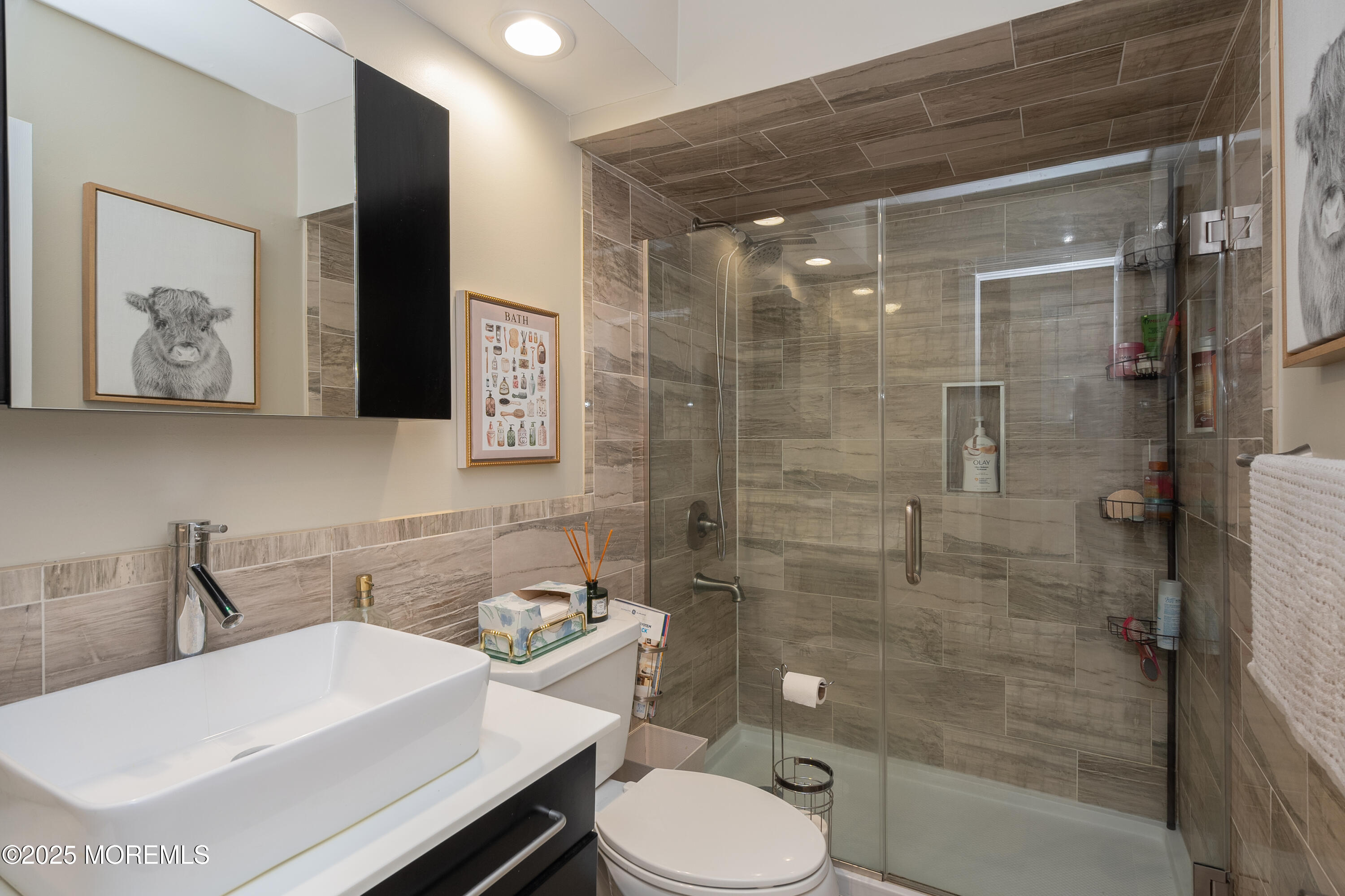 121 Milton Avenue Cliffwood, NJ 07721 - Photo 26 of 34 a bathroom with a sink toilet and shower