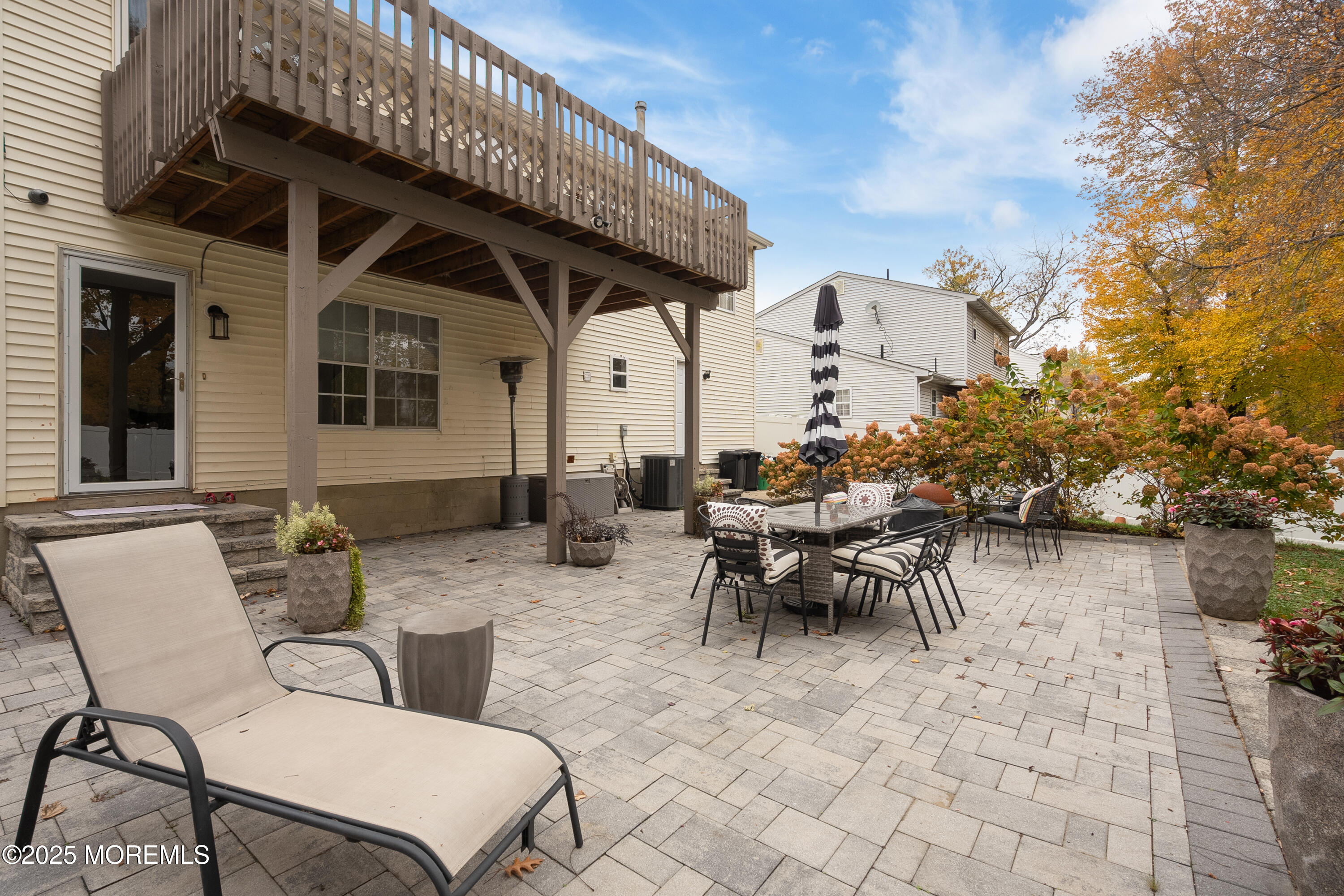 121 Milton Avenue Cliffwood, NJ 07721 - Photo 29 of 34 a view of a patio with table and chairs and potted plants