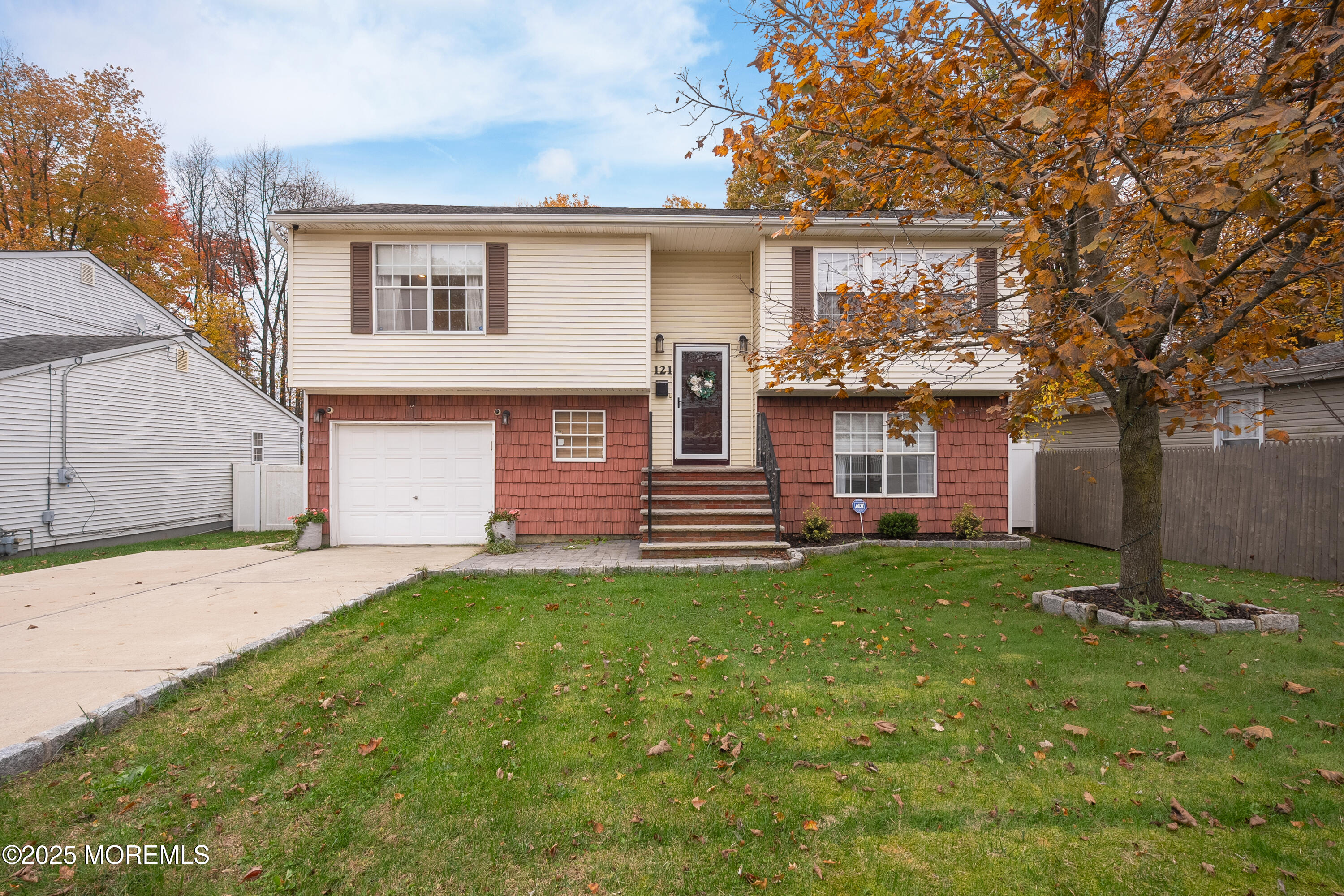 121 Milton Avenue Cliffwood, NJ 07721 - Photo 3 of 34 a front view of a house with a garden