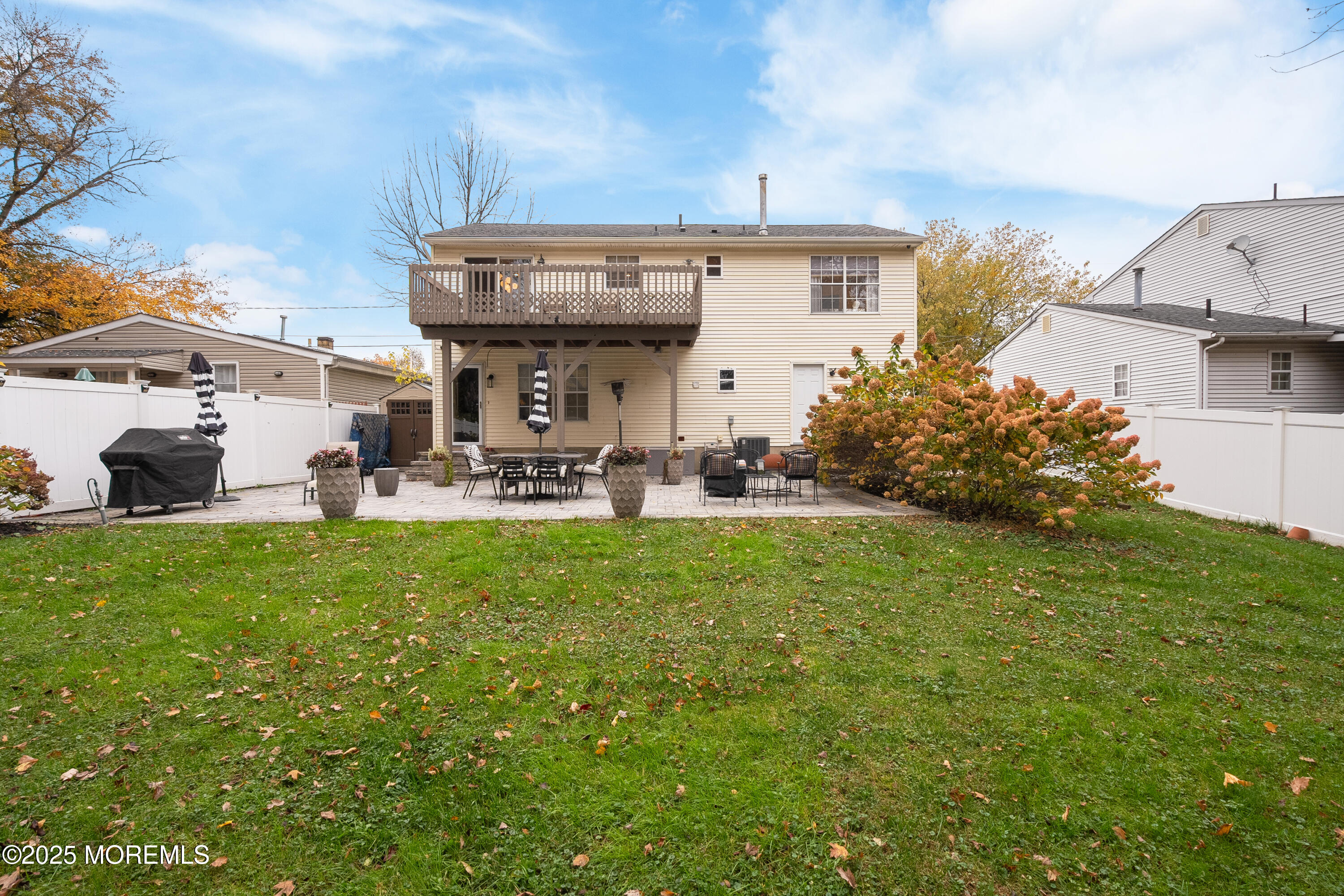 121 Milton Avenue Cliffwood, NJ 07721 - Photo 32 of 34 a view of a patio with table and chairs and potted plants