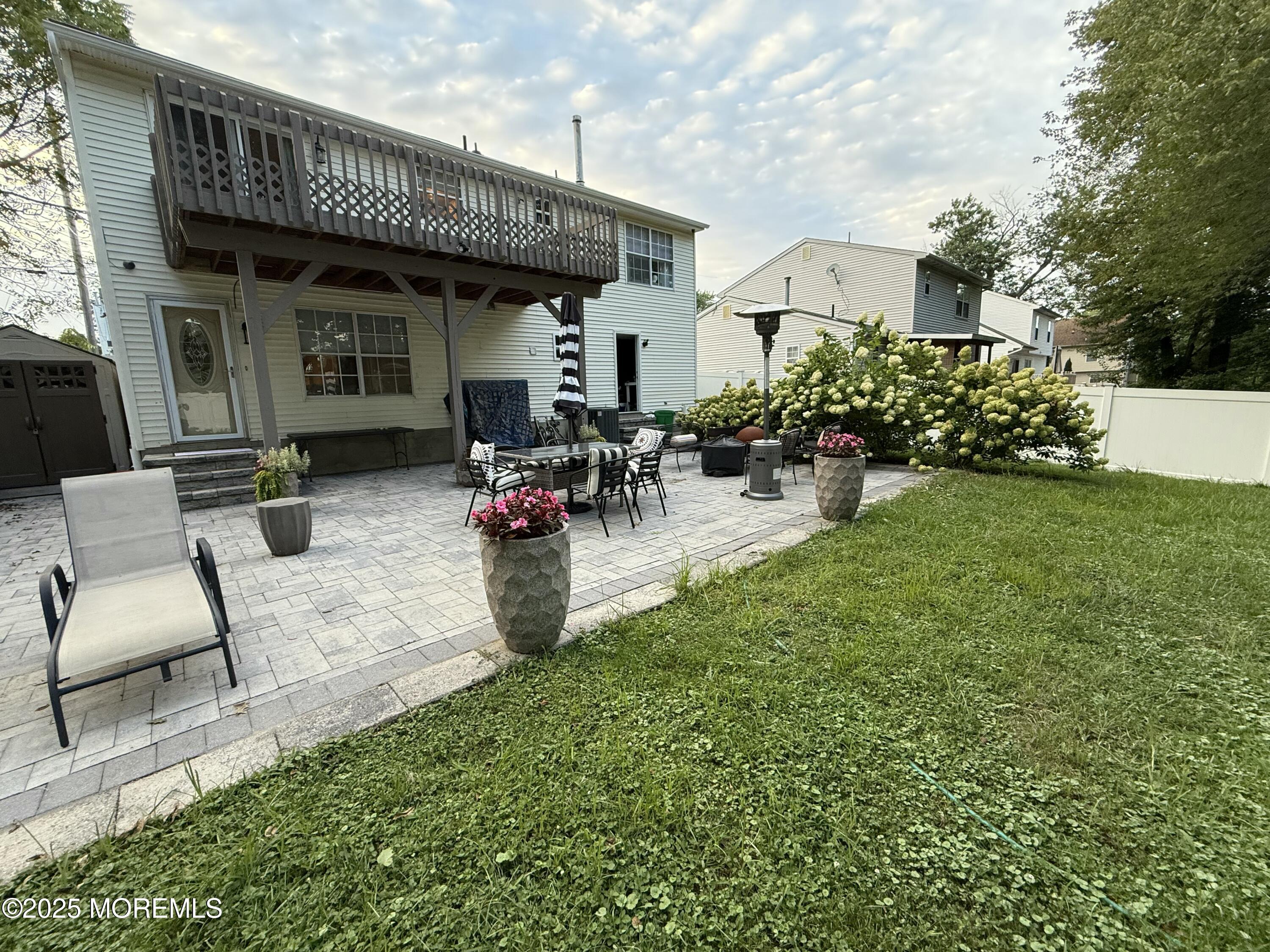 121 Milton Avenue Cliffwood, NJ 07721 - Photo 33 of 34 a view of a house with backyard and sitting area
