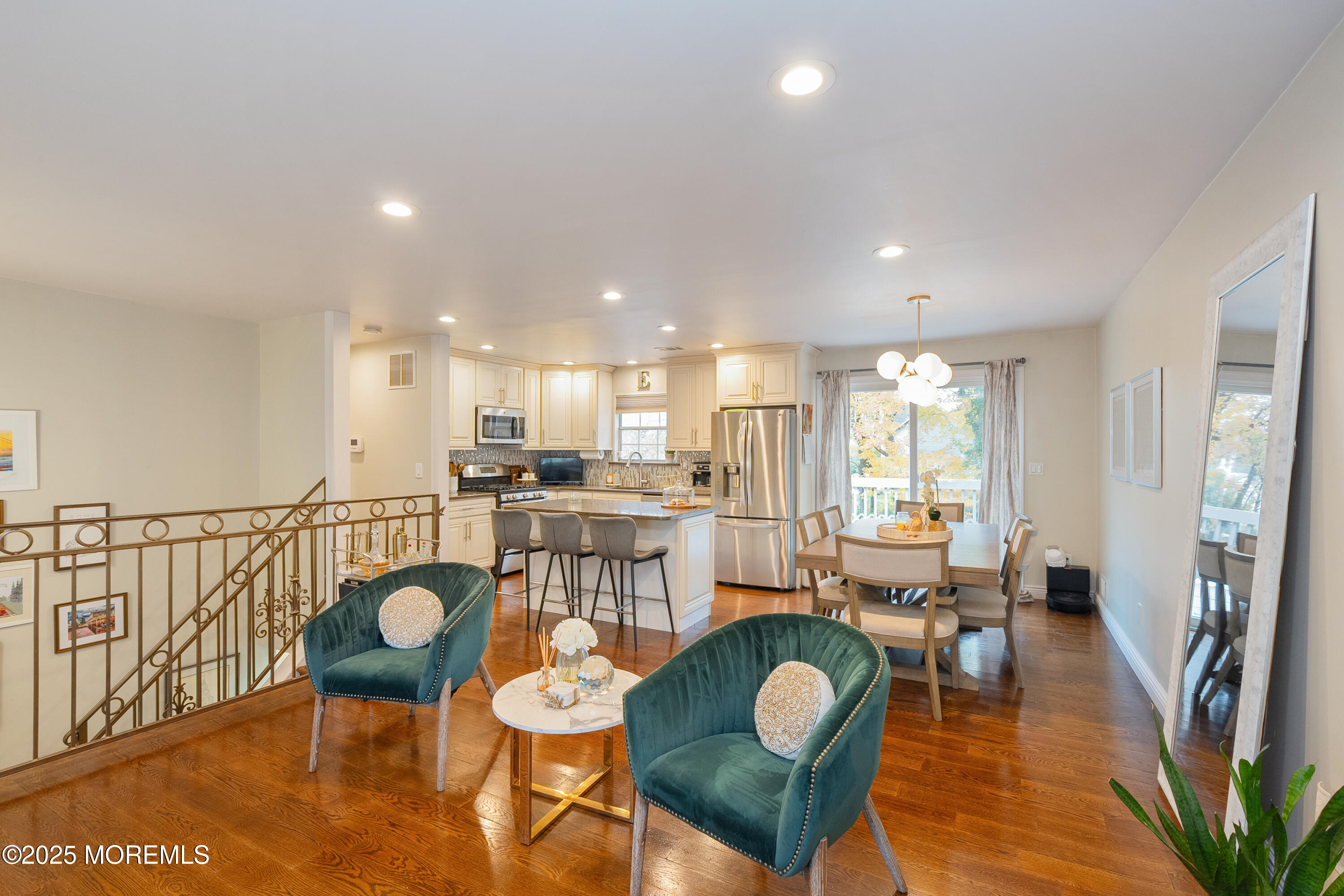 121 Milton Avenue Cliffwood, NJ 07721 - Photo 5 of 34 a view of a dining room kitchen with furniture wooden floor and a rug