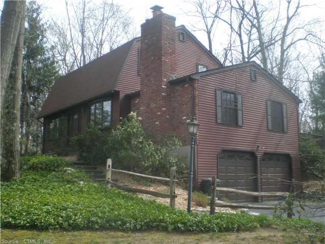 395 New England Road Guilford, CT 06437 - Photo 1 of 1 a front view of a house with a yard