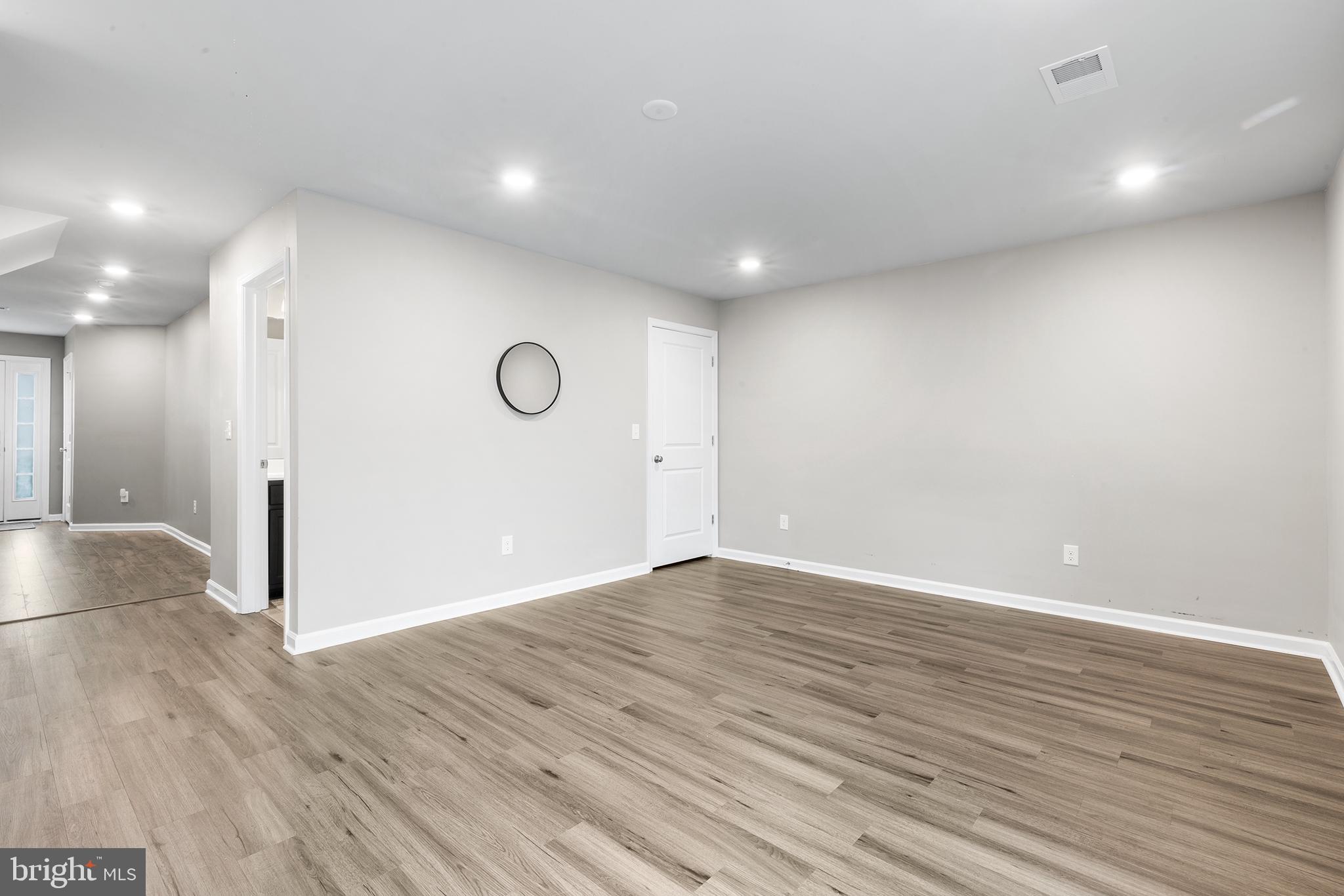 62 Rome Way Mount Laurel, NJ 08054 - Photo 11 of 31 a view of an empty room with wooden floor