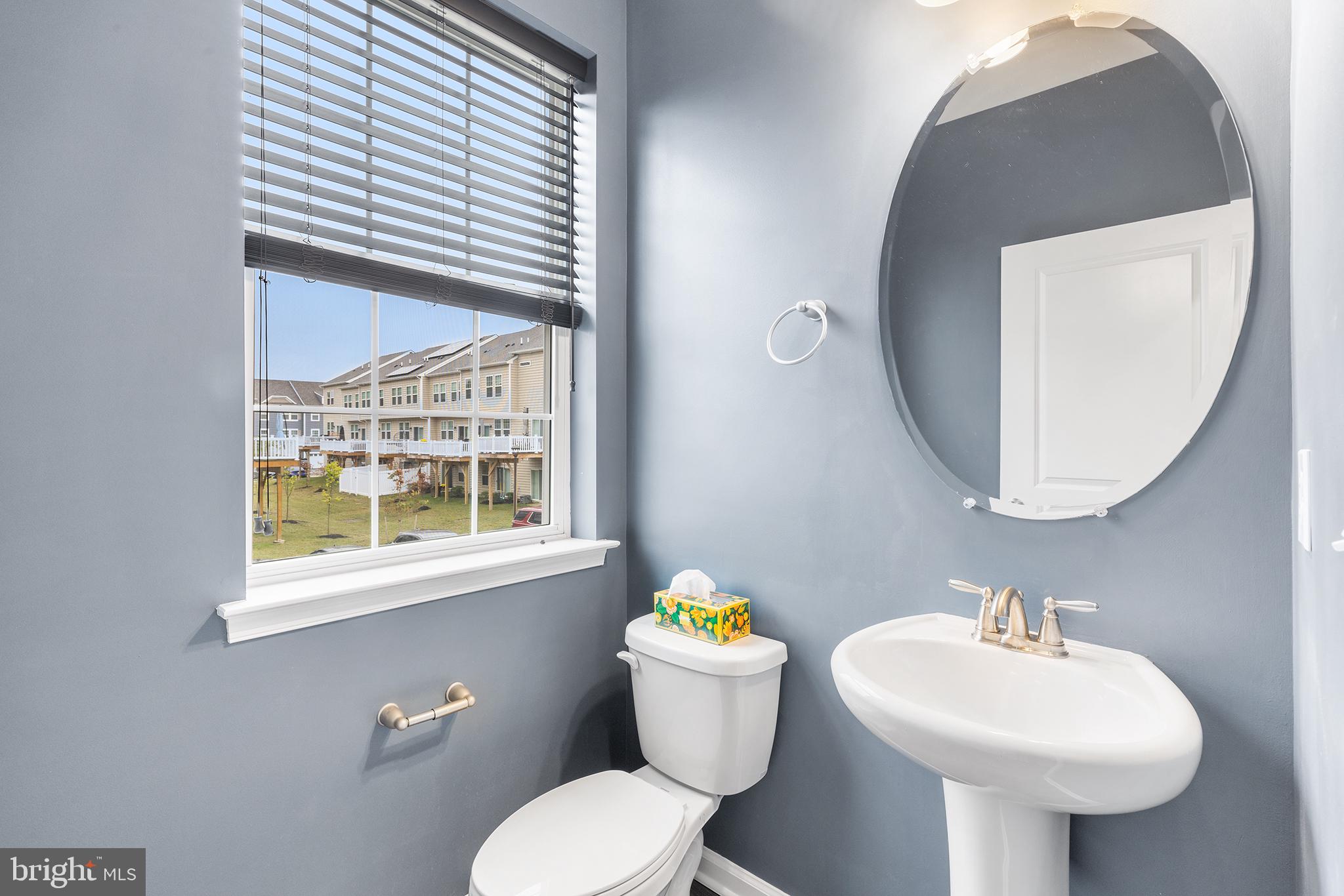 62 Rome Way Mount Laurel, NJ 08054 - Photo 13 of 31 a bathroom with a sink toilet and a mirror