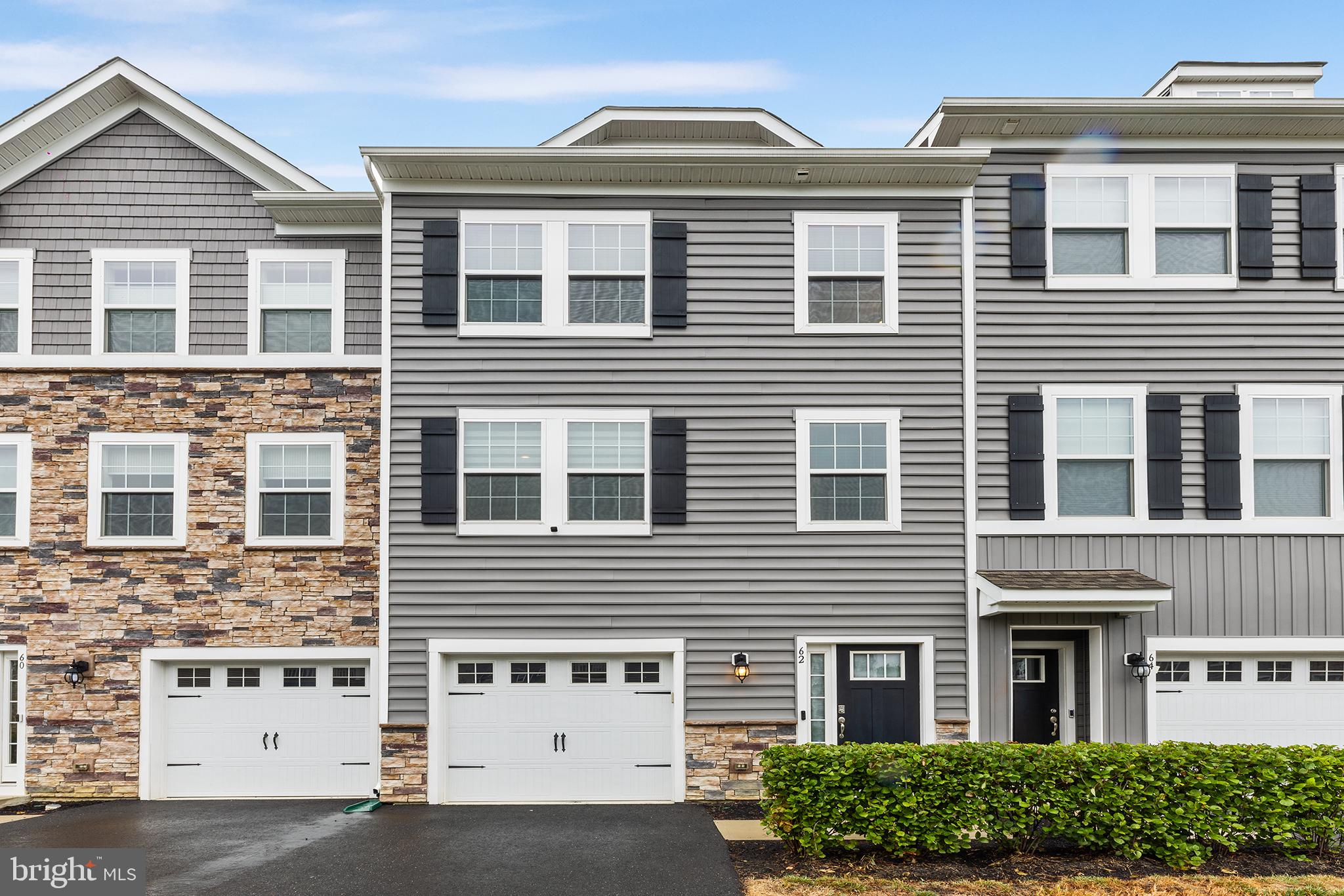 62 Rome Way Mount Laurel, NJ 08054 - Photo 2 of 31 a front view of a house with a yard