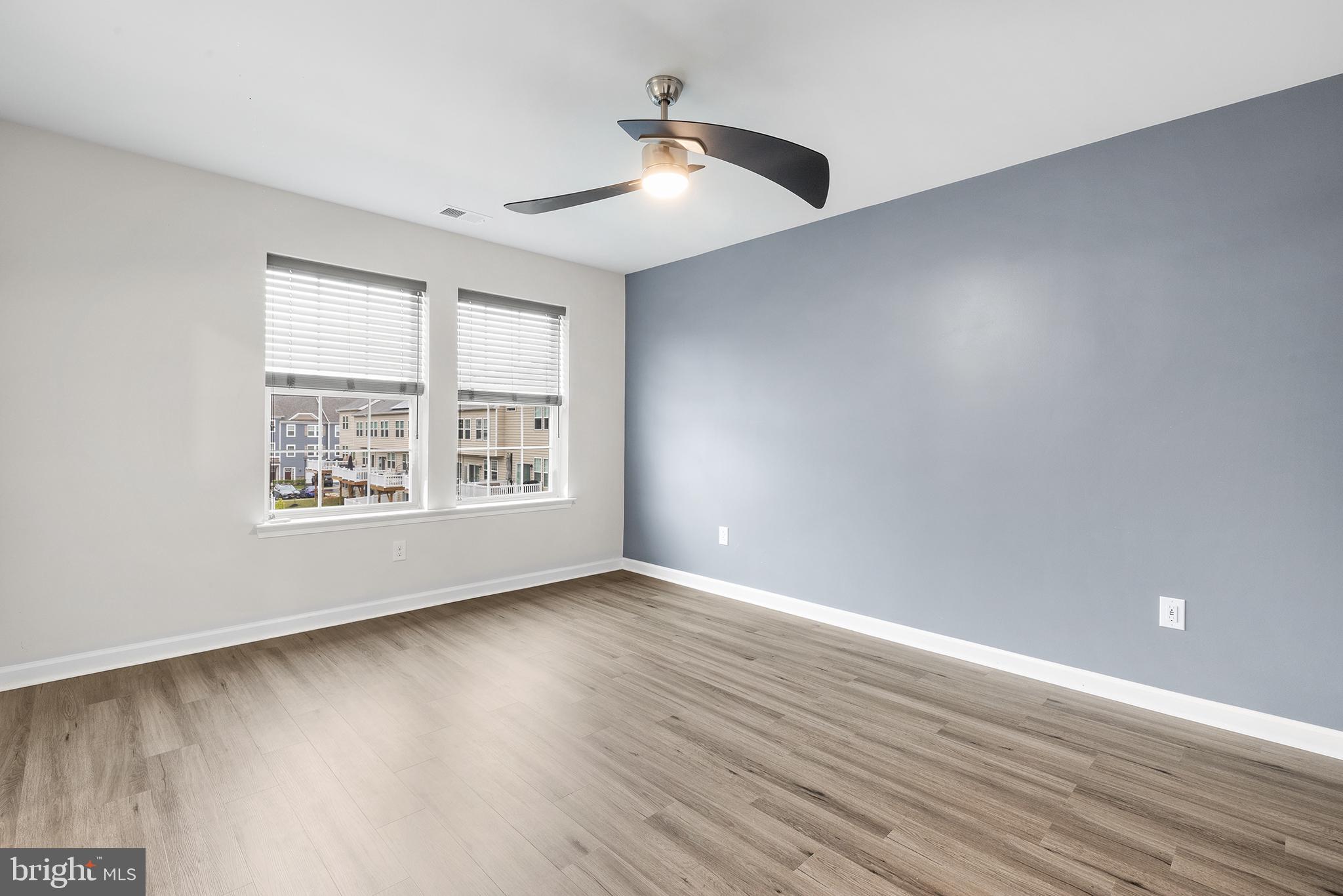 62 Rome Way Mount Laurel, NJ 08054 - Photo 25 of 31 a view of an empty room with wooden floor and a window