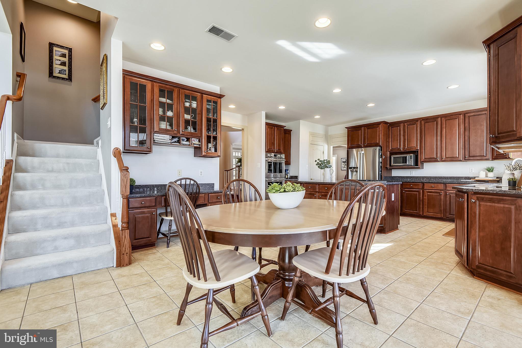 1408 Monforte Drive Davidsonville, MD 21035 - Photo 11 of 65 Breakfast room with second staircase