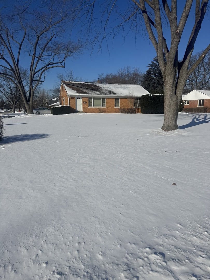 1226 Wilmot Road Deerfield, IL 60015 - Photo 1 of 2 a view of street with large trees