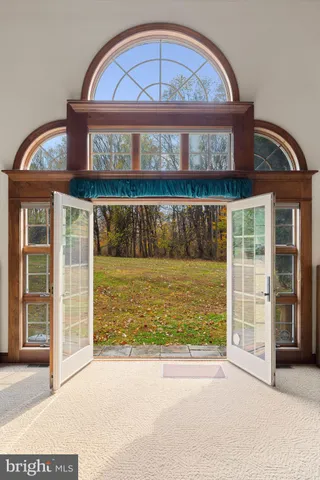 a view of a fireplace with a large window