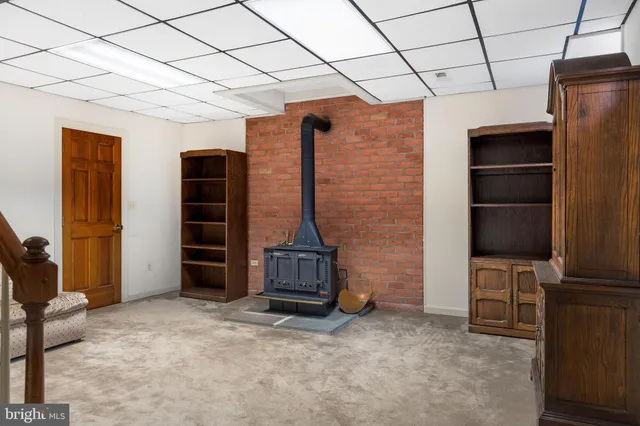 a view of livingroom with furniture and natural light