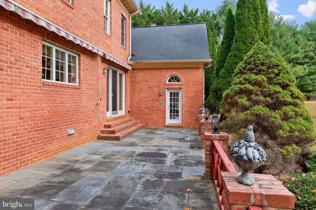 a backyard of a house with seating space