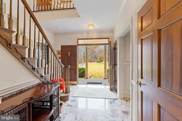 a view of an entryway with staircase