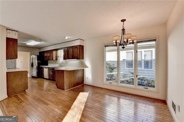 a bathroom with a shower and toilet