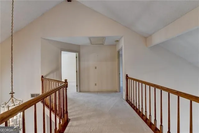 a view of balcony with wooden floor