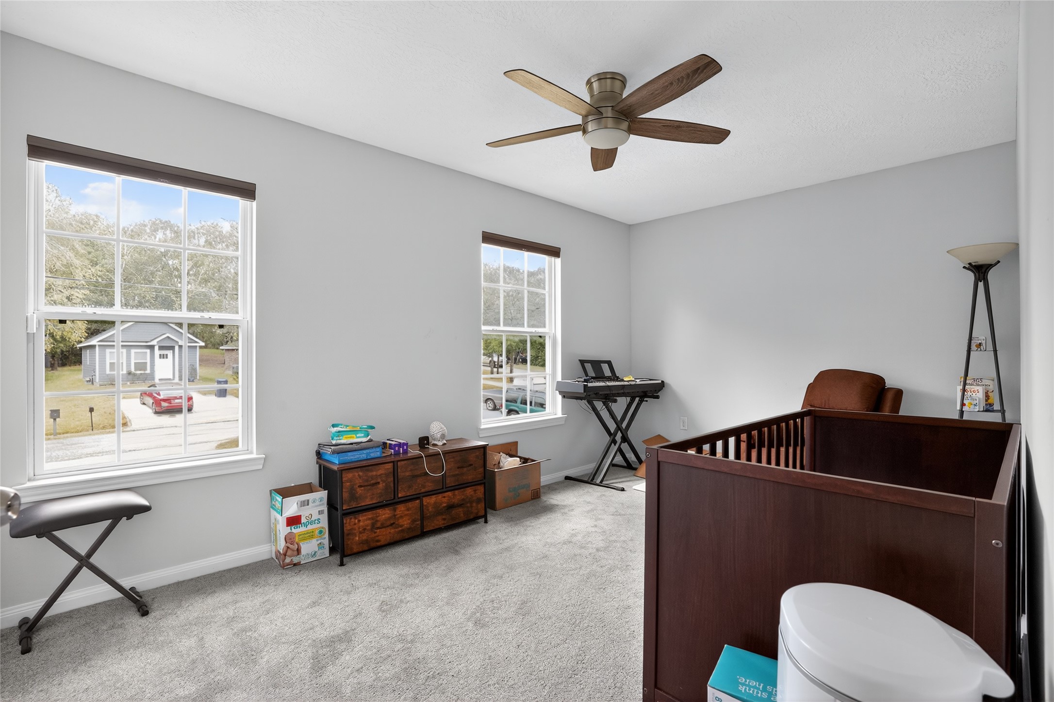 14986 Crockett Road Willis, TX 77378 - Photo 12 of 16 a living room with furniture and a window