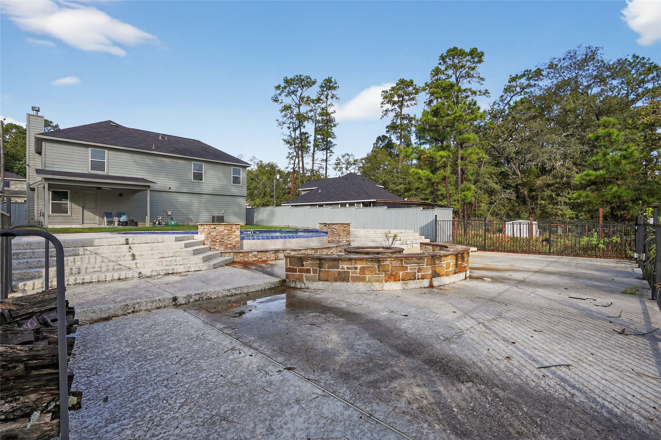 14986 Crockett Road Willis, TX 77378 - Photo 16 of 16 a view of a backyard with sitting area