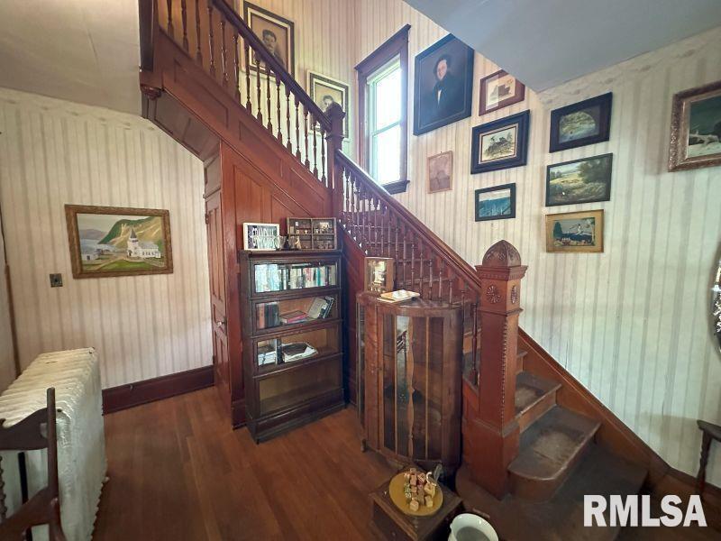 605 Fulton Street Grand Mound, IA 52751 - Photo 10 of 16 a view of entryway and hall with wooden floor