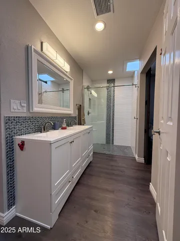 a room with walk in closet and a window