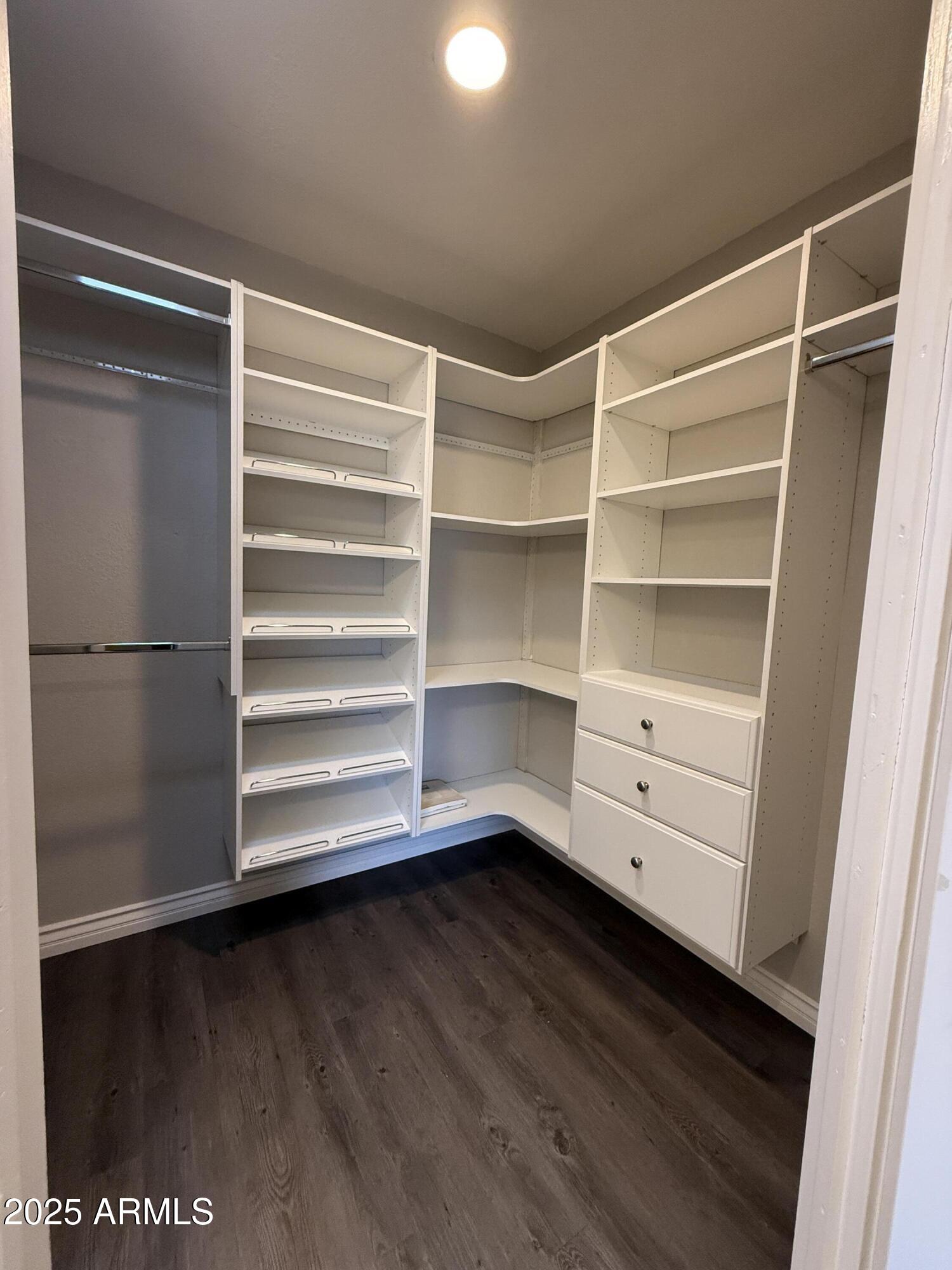 25208 South Angora Court Sun Lakes, AZ 85248 - Photo 22 of 22 a room with walk in closet and a window