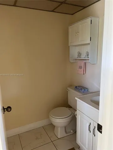 a view of a hallway with a white house