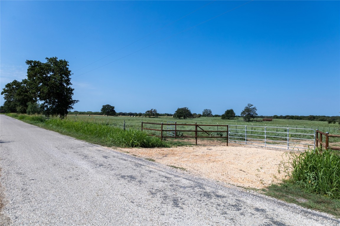 8080 Old Colony Line Road Dale, TX 78616 - Photo 1 of 1 a view of a lake with outdoor space