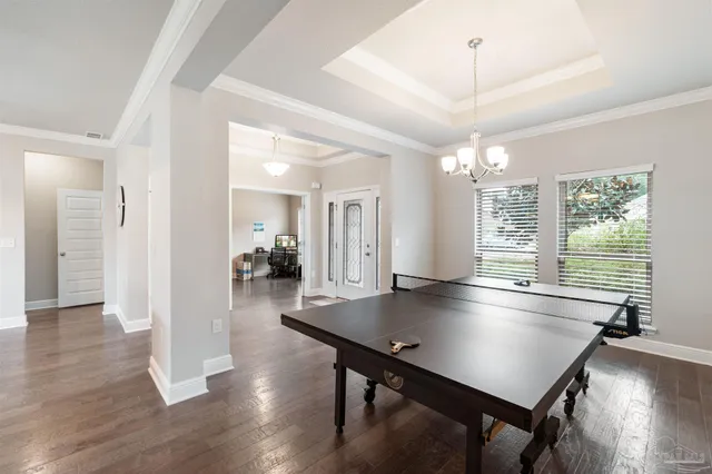 a bathroom with double sink and a mirror