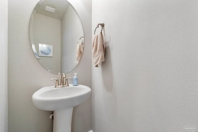 a bathroom with a sink and a bathtub