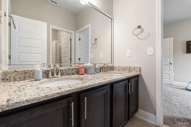 a front view of a house with a big yard