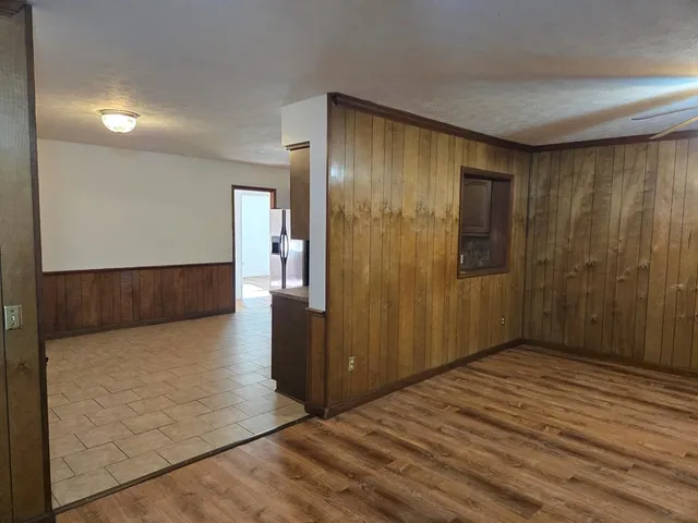 a kitchen with stainless steel appliances granite countertop a sink and cabinets