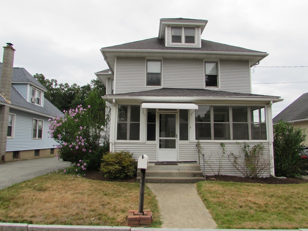37 Barrison Street Springfield, MA 01109 - Photo 1 of 17 a front view of a house with a yard