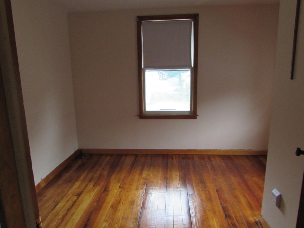 37 Barrison Street Springfield, MA 01109 - Photo 13 of 17 a view of a room with wooden floor and a window