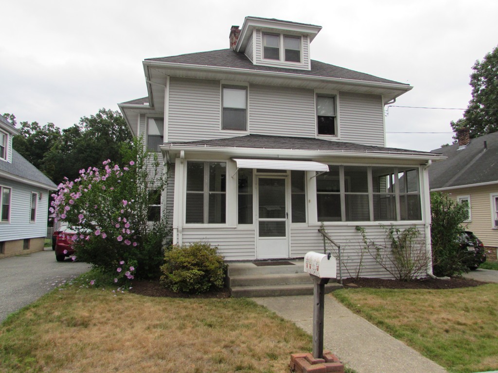37 Barrison Street Springfield, MA 01109 - Photo 17 of 17 a front view of a house with garden