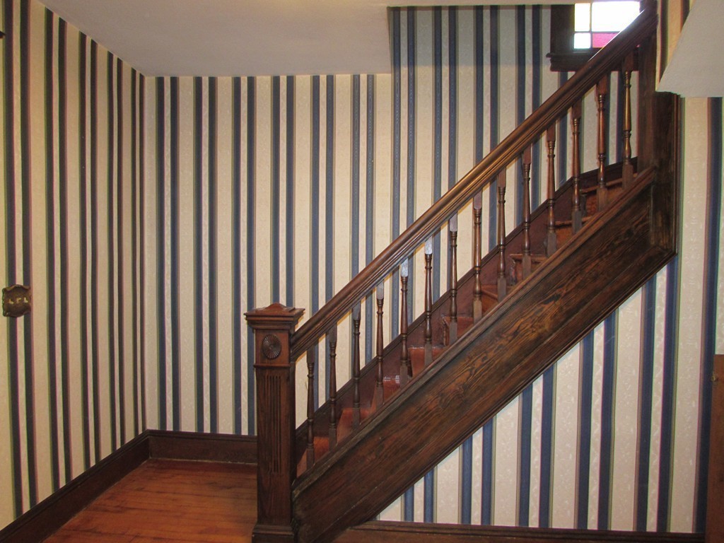 37 Barrison Street Springfield, MA 01109 - Photo 8 of 17 a view of staircase with wooden floor and stairs