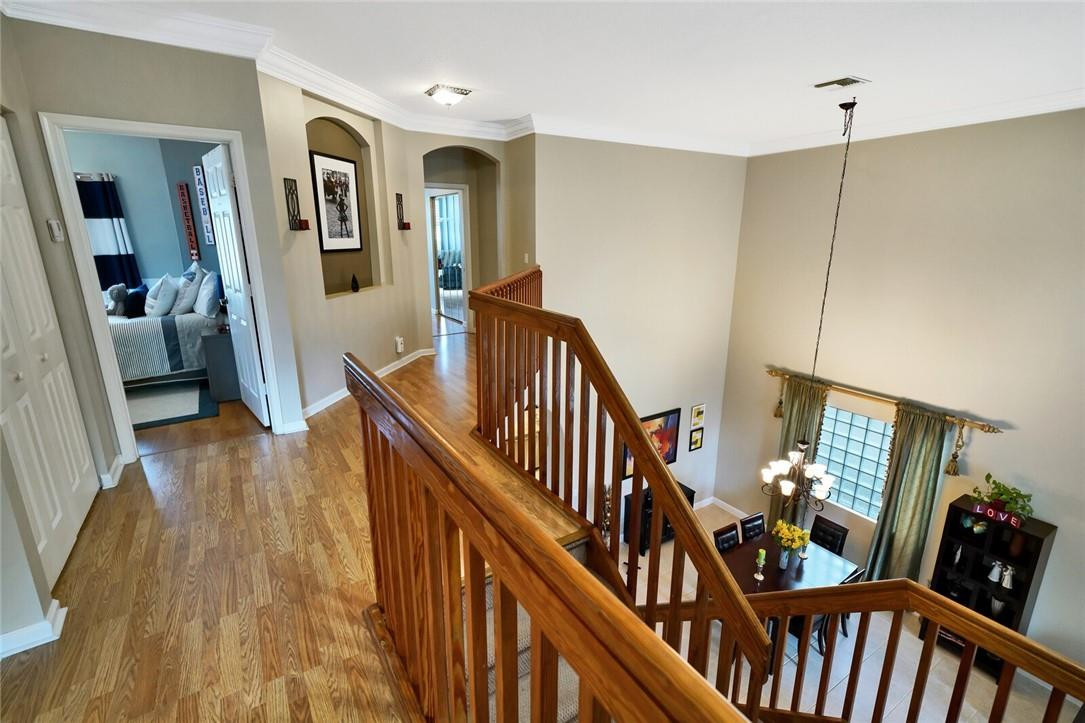9685 Vineyard Court Boca Raton, FL 33428 - Photo 23 of 45 a view of an entryway wooden floor and stairs