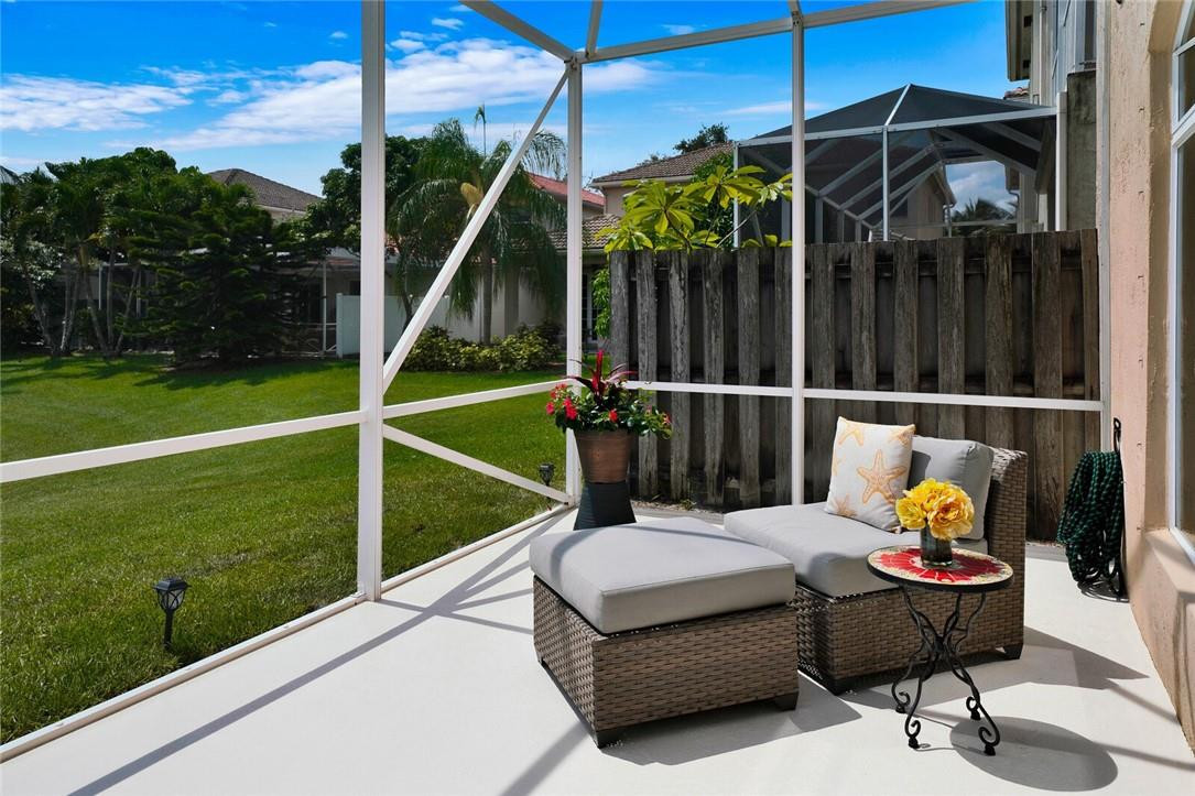 9685 Vineyard Court Boca Raton, FL 33428 - Photo 34 of 45 a garden view with a seating space