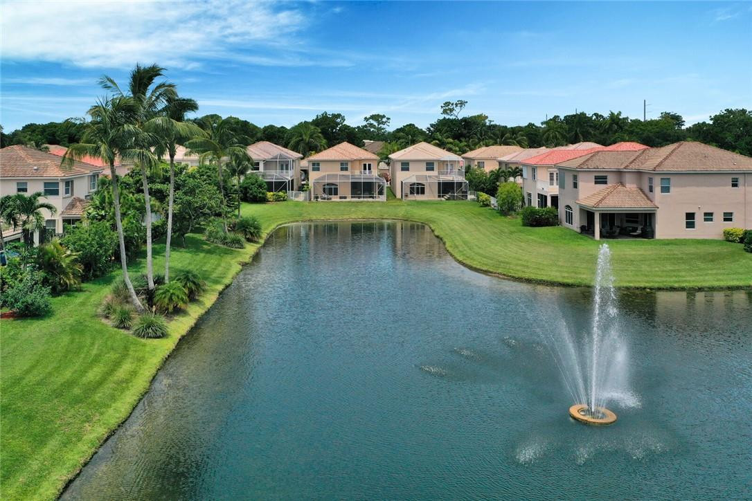 9685 Vineyard Court Boca Raton, FL 33428 - Photo 39 of 45 an aerial view of a house with swimming pool garden view and lake view