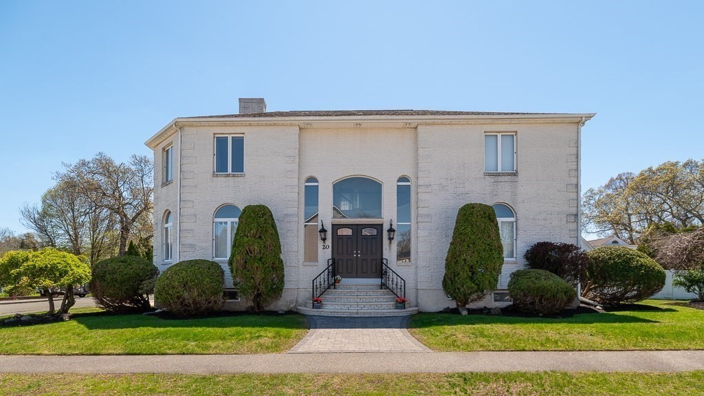 20 Landers Road Stoneham, MA 02180 - Photo 1 of 36 a front view of a house with garden